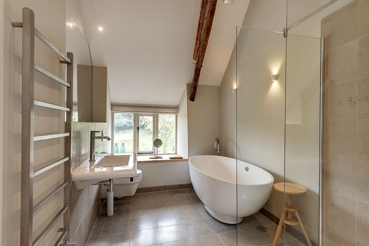 Modern bathroom with slanted ceiling in white