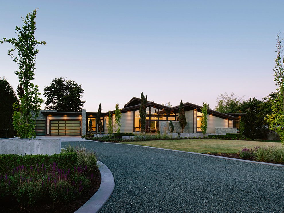 Modern home in a rural area with a long driveway