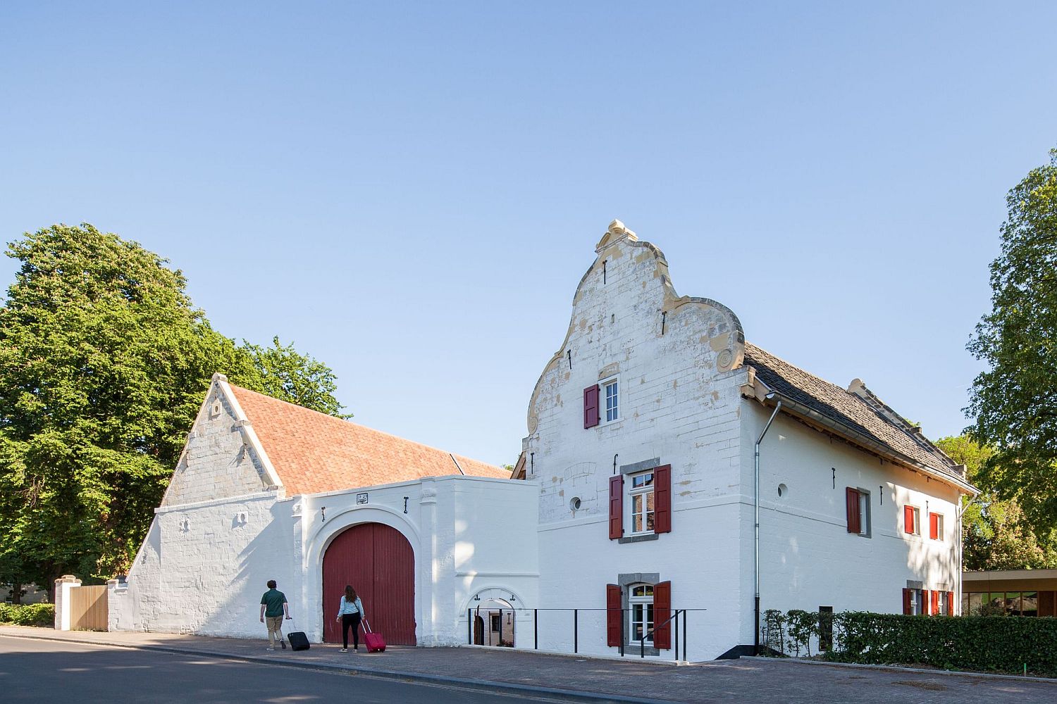 Modern structure and historic buildings sit side by side at the Manor Farm