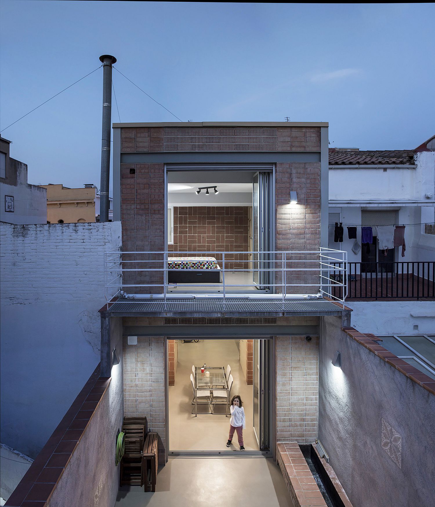 Old blacksmith workshop altered into contemporary home in Barcelona