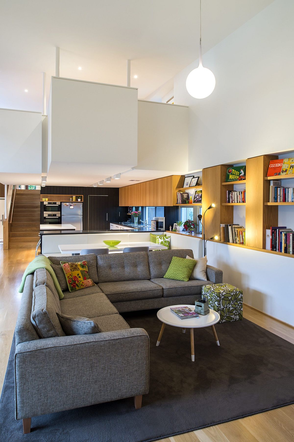 Open plan living area with large gray sectional