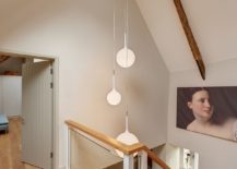 Pendant-lights-illuminate-the-lovely-stairwell-217x155