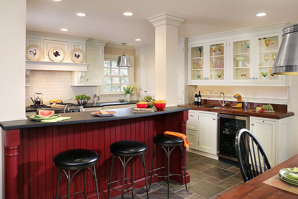 Red island energizes traditional kitchen in white