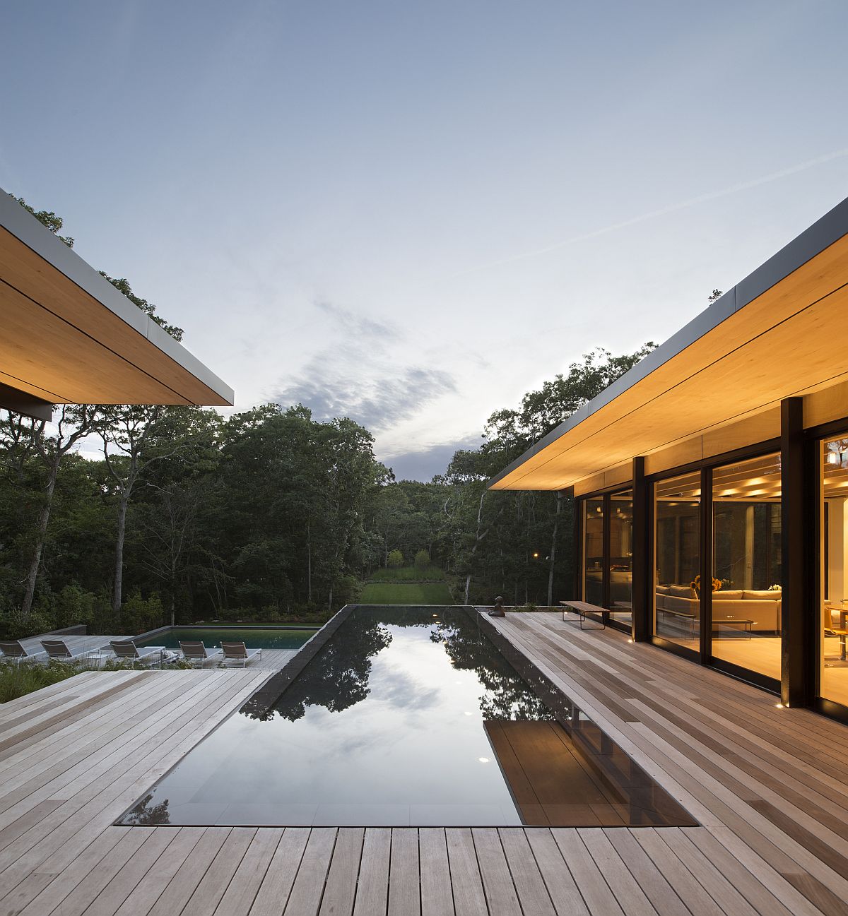 Reflective pool between the two wings of the house