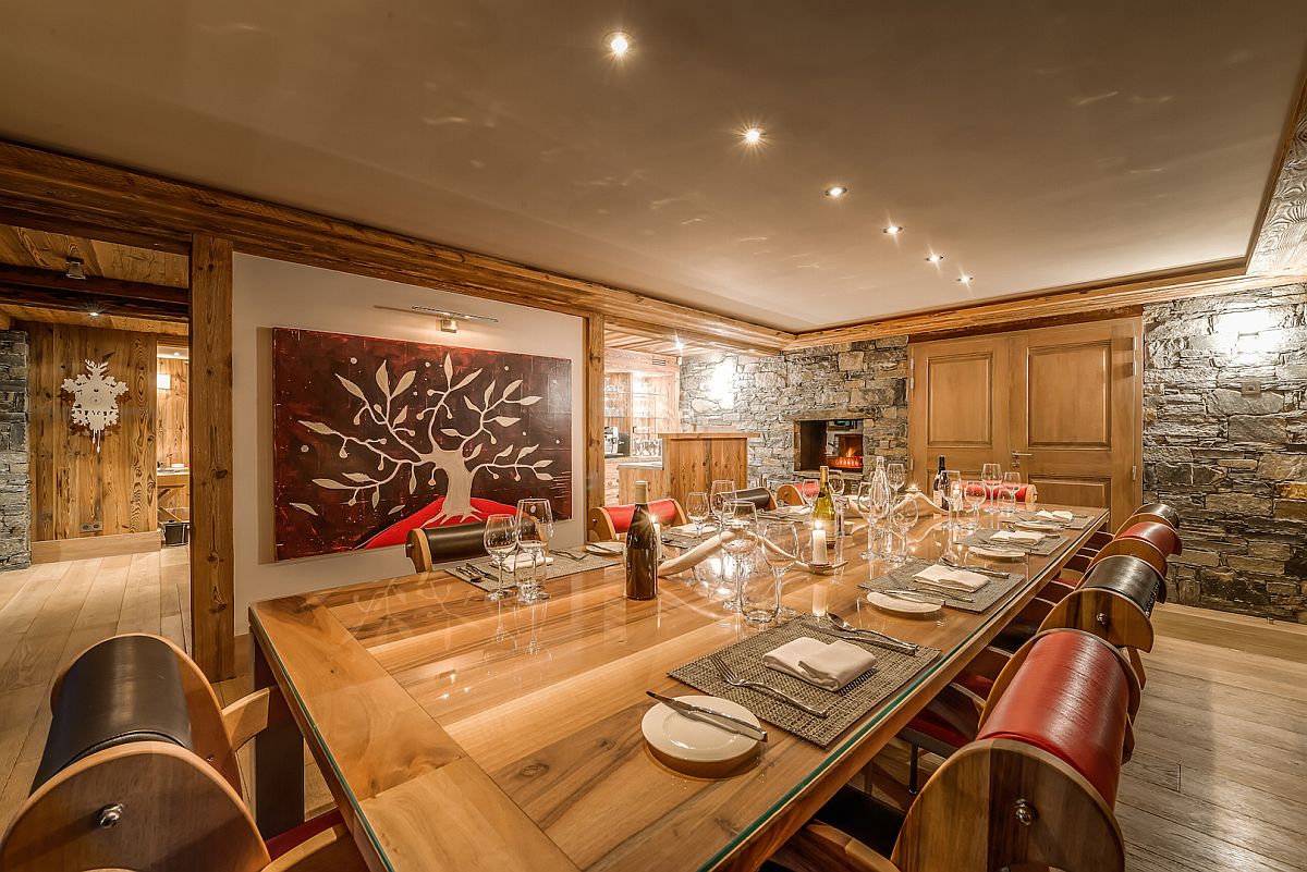 Sliding barn door coupled with brilliant art work for the chalet dining room