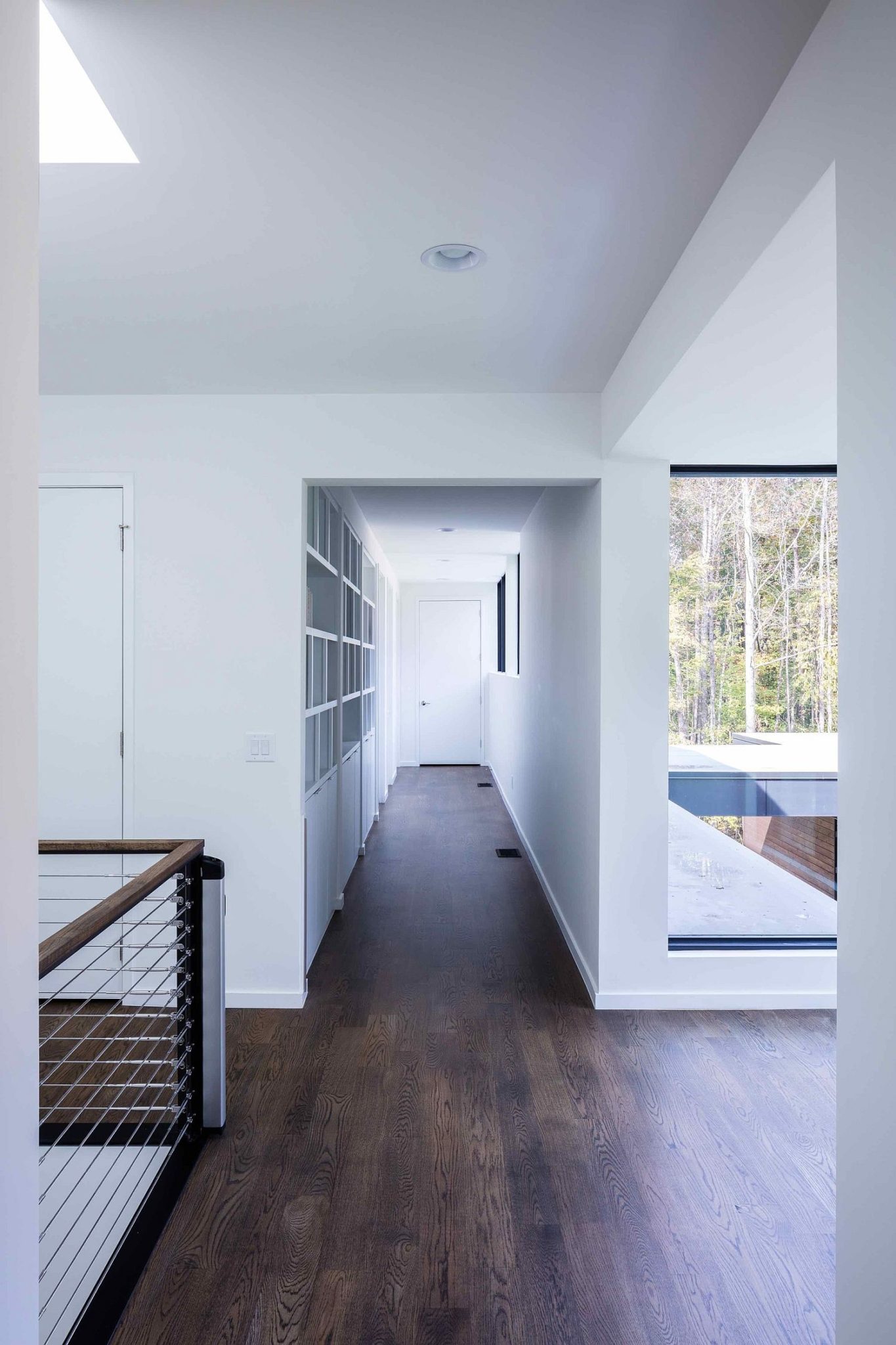 Space-savvy shelving in the corridor