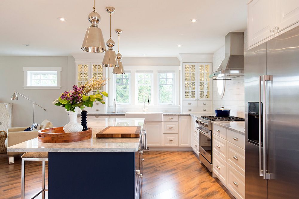 Sparkling-kitchen-island-with-marble-coutertop-and-bluish-gray-finish