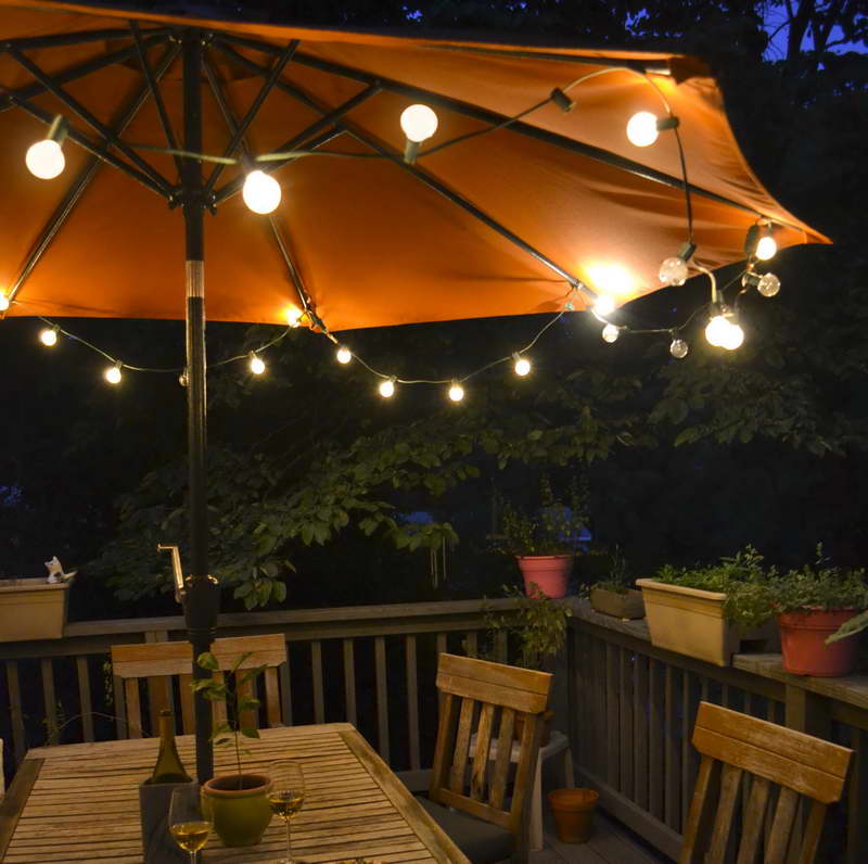 String lights hung on a patio umbrella