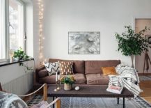 String-lights-illuminating-the-corner-of-the-living-room--217x155