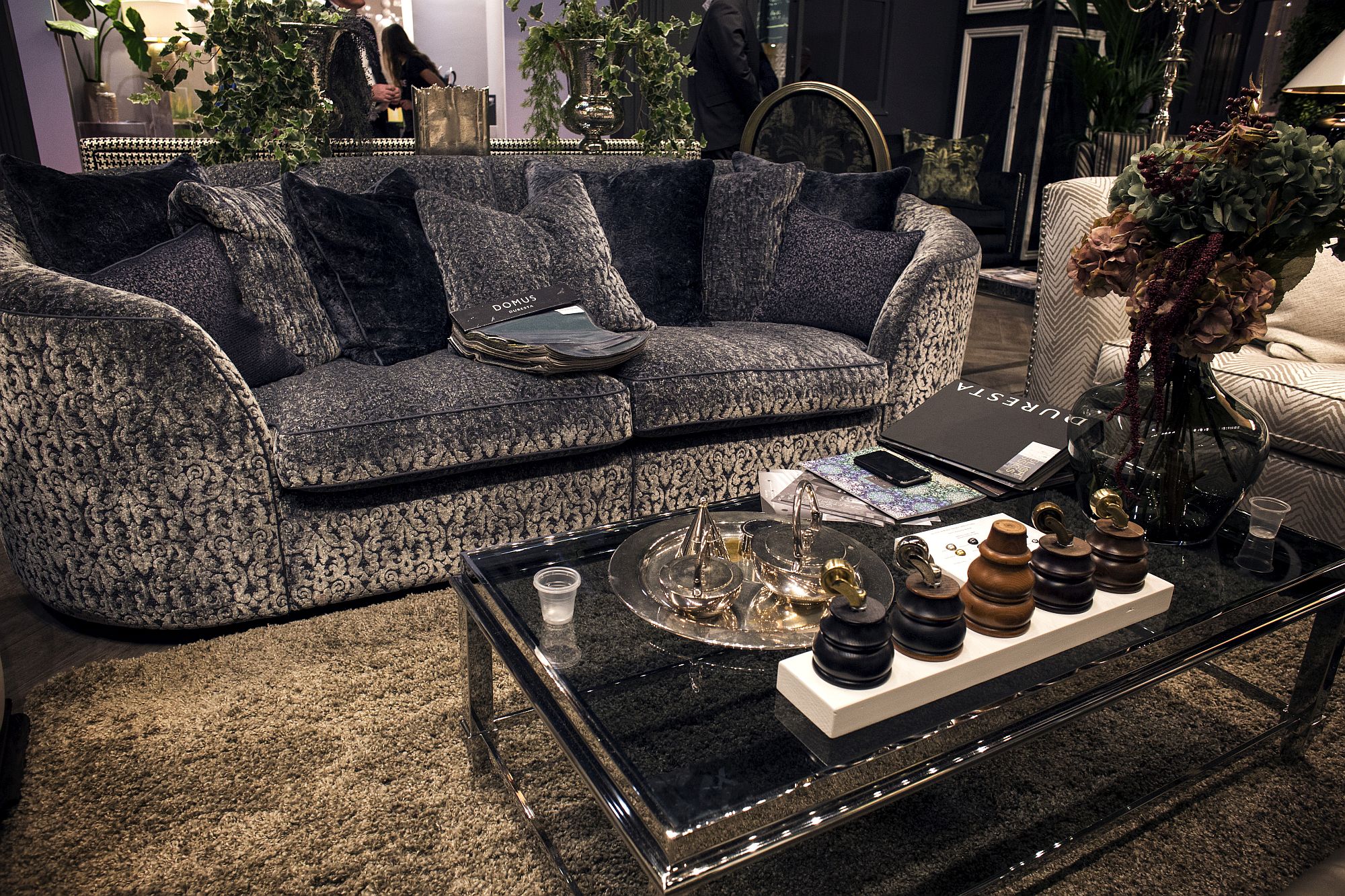 Stylish coffee table with glassy charm and a hint of black elegance