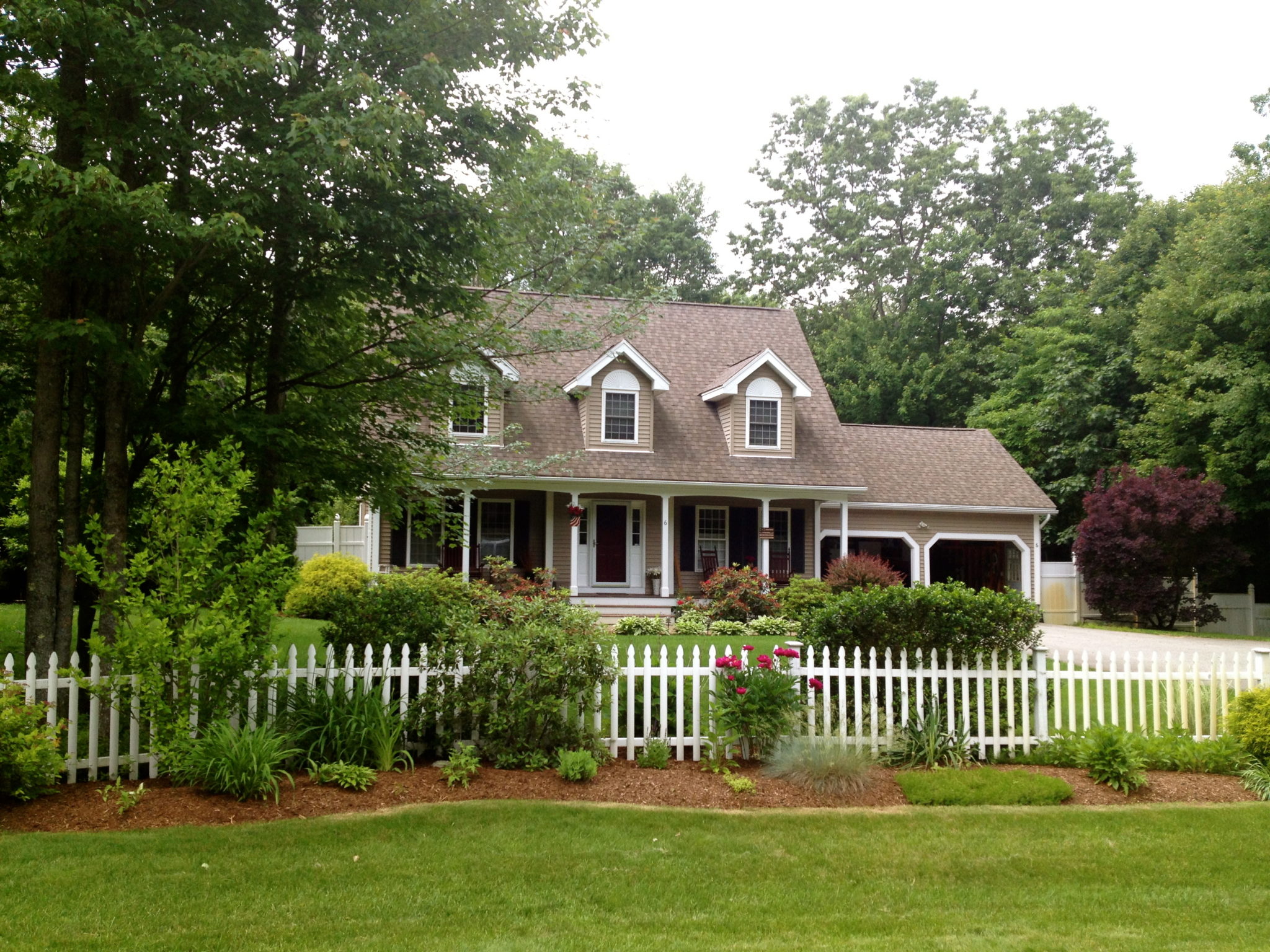 The classic picket fence gives the house a domestic feeling