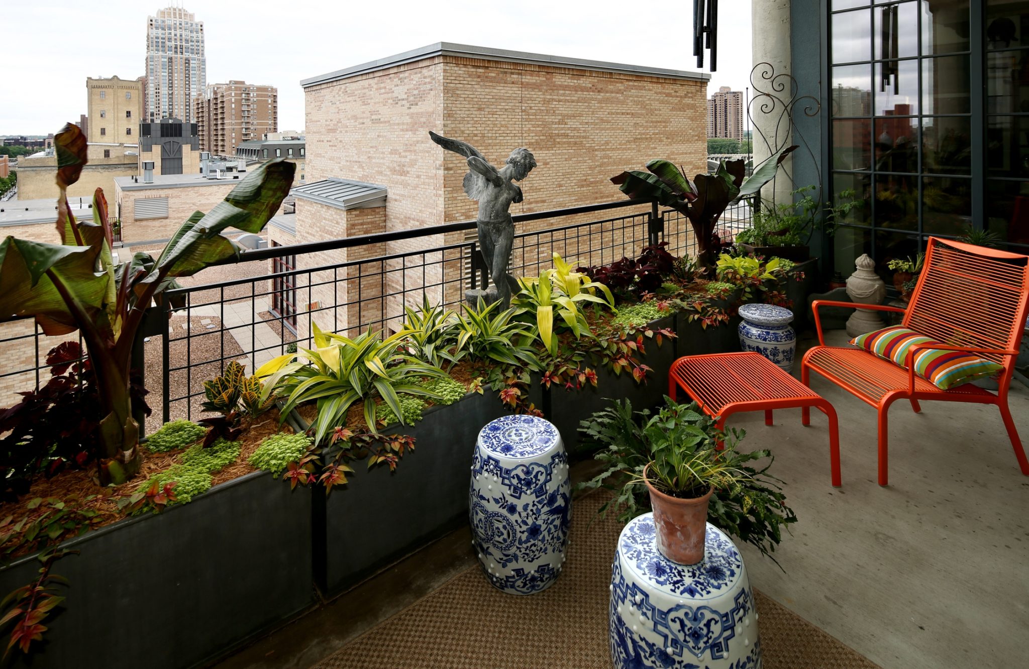 Urban balcony garden with matte raised planters