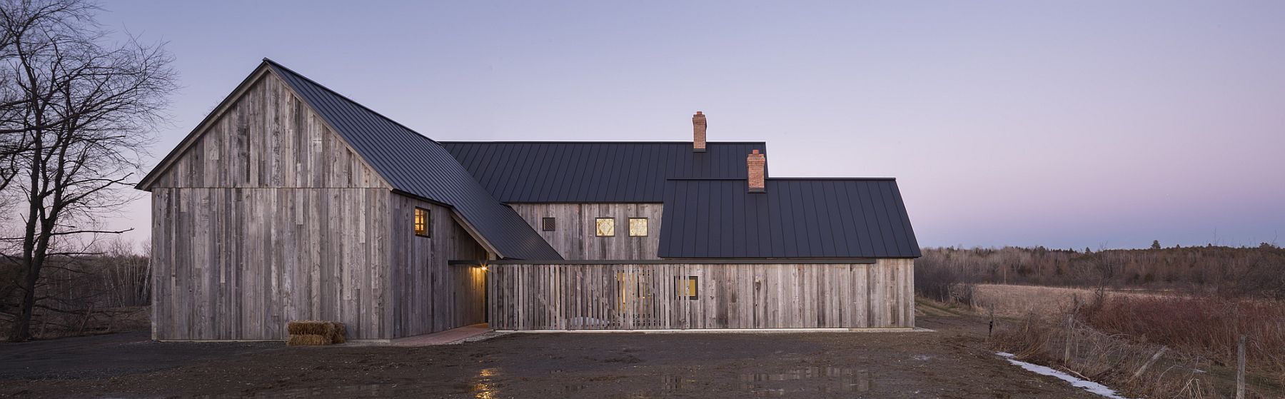 View of the landscape and farms around the modern farmhouse in Canada