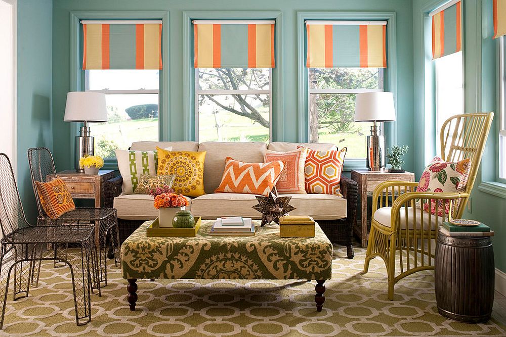 Vivacious sunroom in blue with pops of orange and green