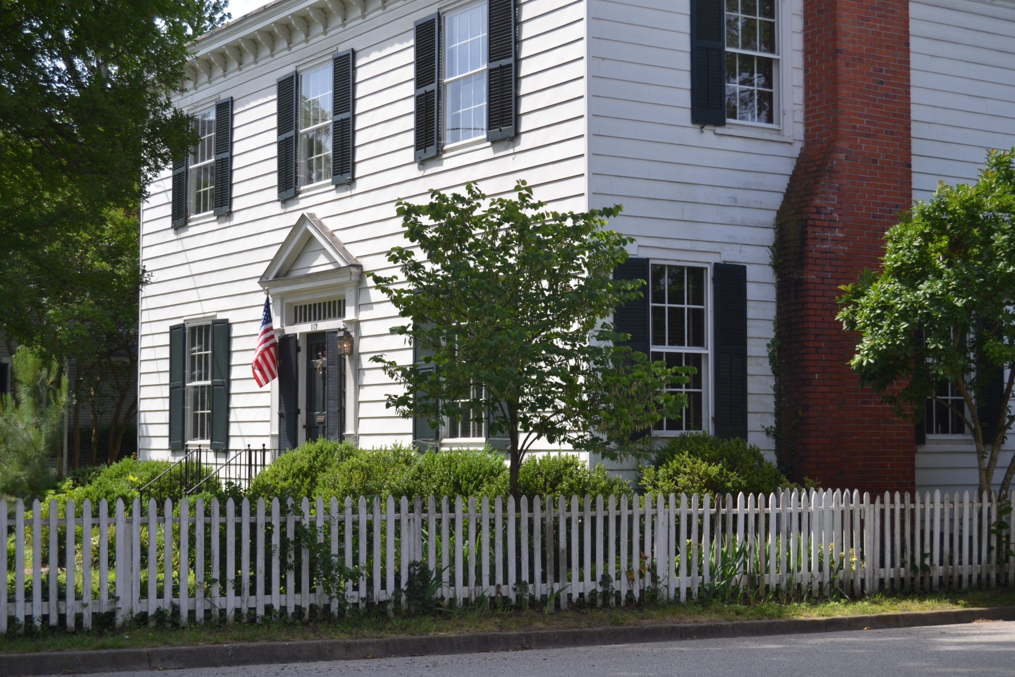 White picket fence with a traditonal appeal