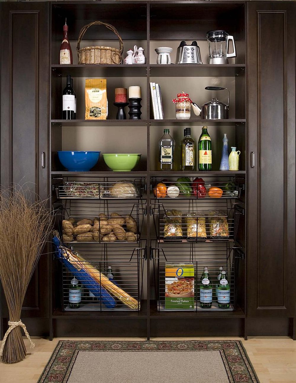 Wiry baskets bring additional storage space to the open pantry