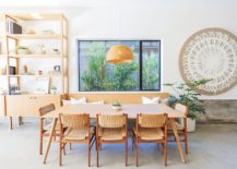 Wooden-dining-table-chairs-and-pendant-light-in-natural-materials-creates-a-cozy-visual-217x155