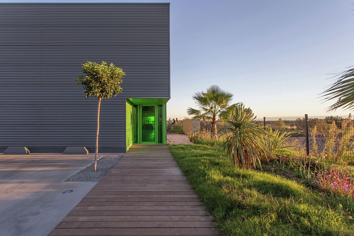 Wooden walkway leading to the entrance of the industrial office and production house