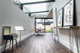 Modern Revamp Involving a Glass Roof Transforms This Dark Victorian House