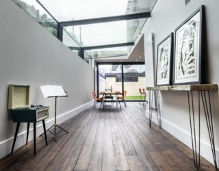 Modern Revamp Involving a Glass Roof Transforms This Dark Victorian House