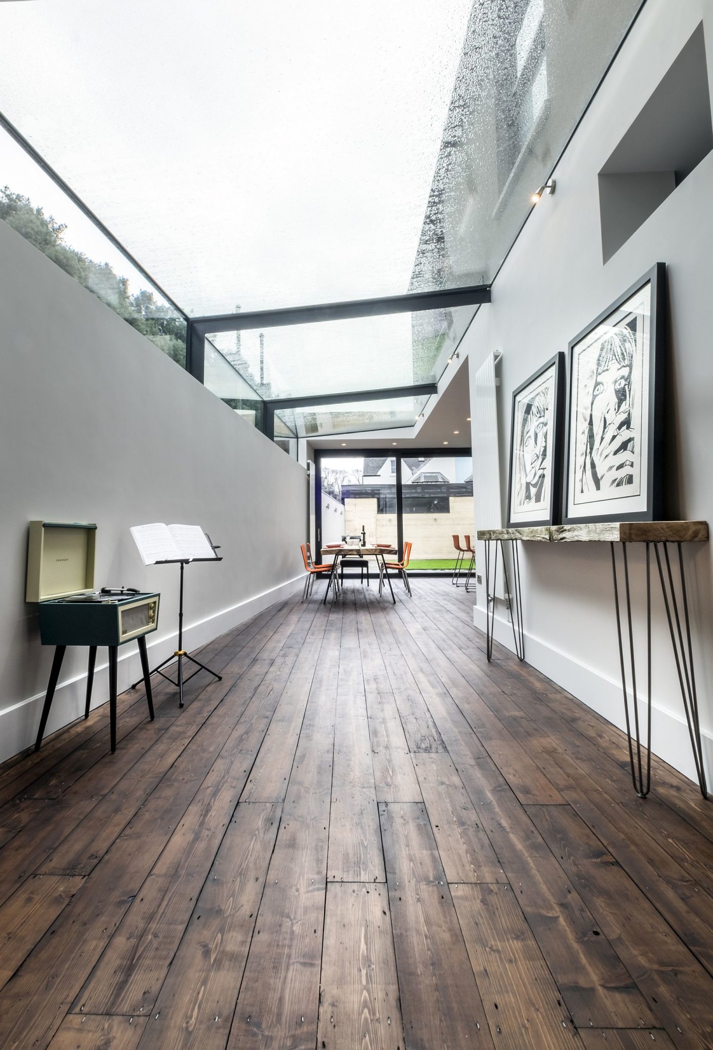 Modern Revamp Involving a Glass Roof Transforms This Dark Victorian House