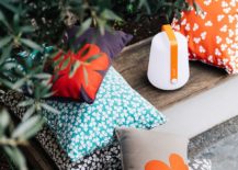 Balad-outdoor-lamp-along-with-Trefle-cushions-create-an-informal-outdoor-hangout-217x155