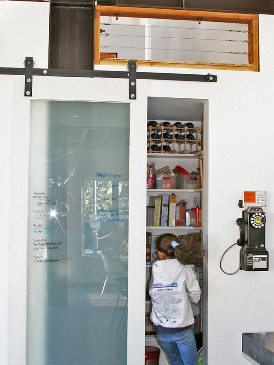 Barn style sliding glass door for the modern pantry