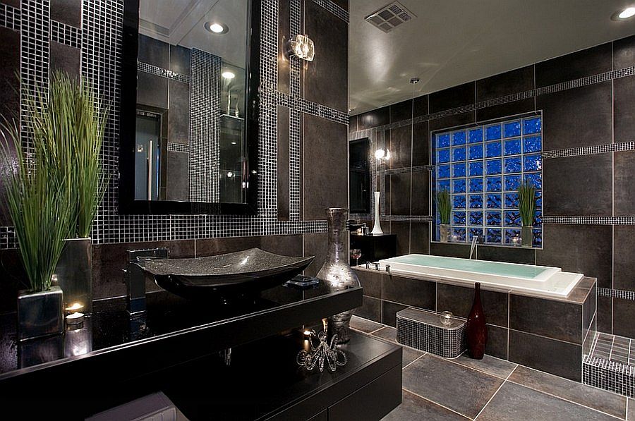 Bathroom in gray and black with a contemporary vanity that offers display space