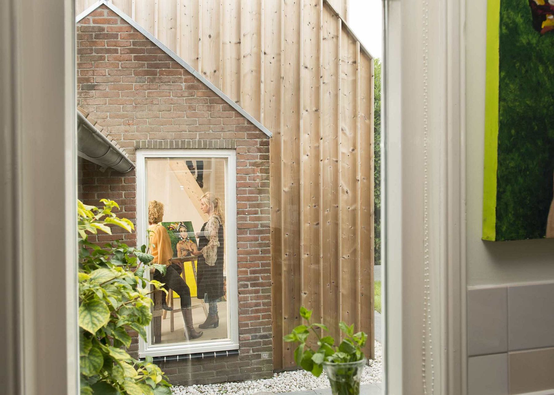 Beautifully framed windows add to the charm of the painting studio