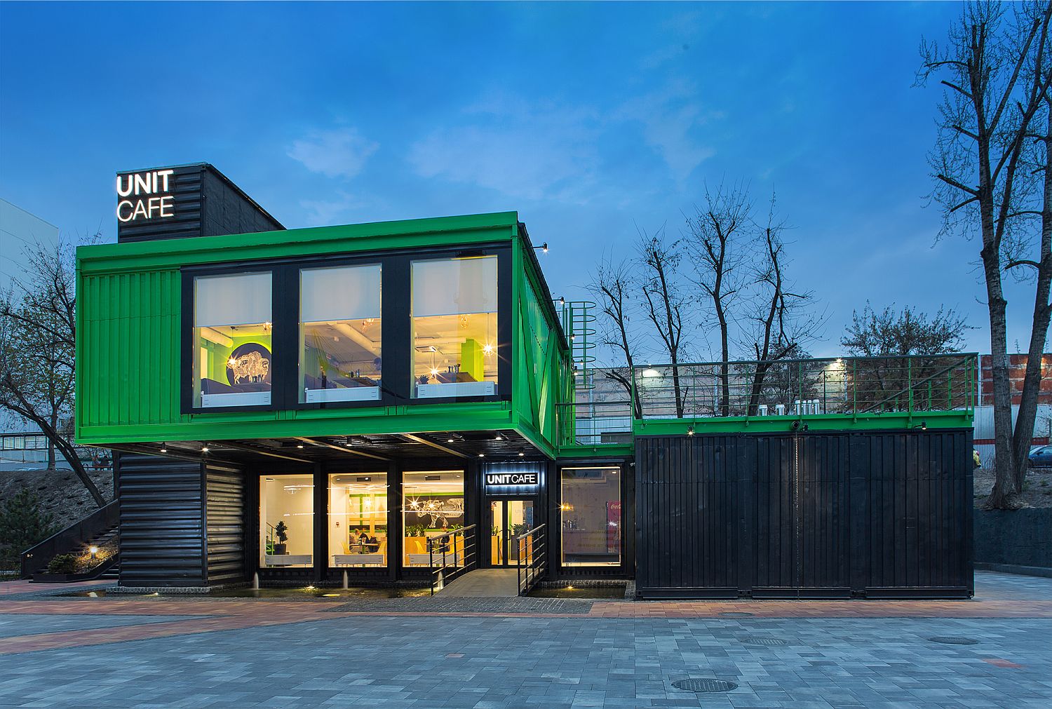 Black and green exterior of the Unit Cafe crafted using shipping containers