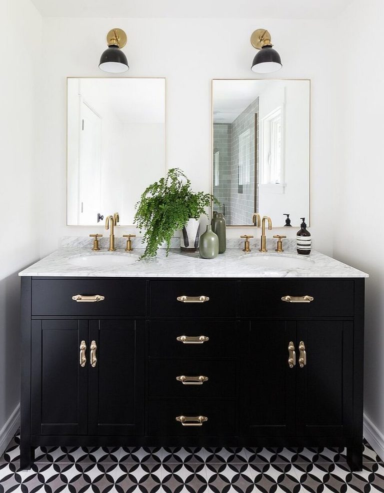 Black-vanity-with-brass-handles-fixtures-and-a-white-marble-countertop-768x985.jpg