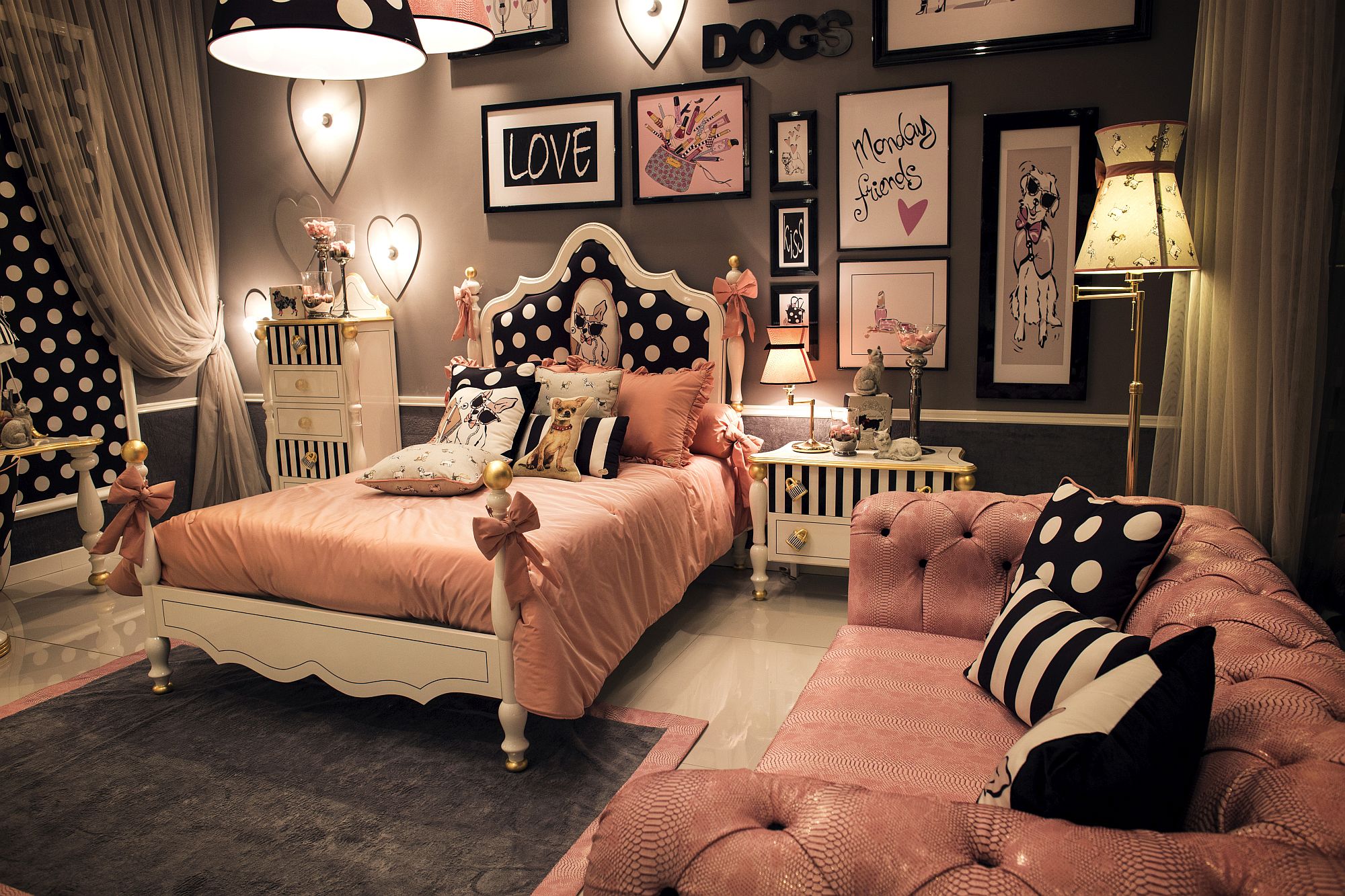 Chic teen bedroom in black and pink with matching lighting fixtures