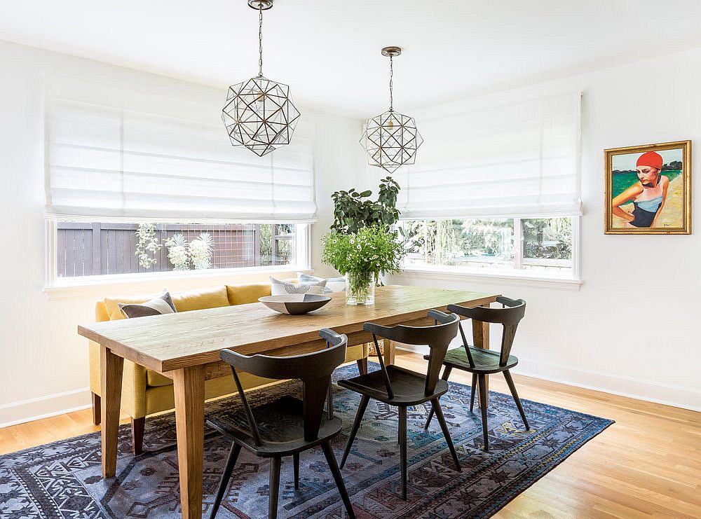 Colorful rug and geo pendants for the shabby chic dining room