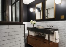 Combining-the-allure-of-black-with-woodsy-warmth-for-a-unique-vanity-217x155
