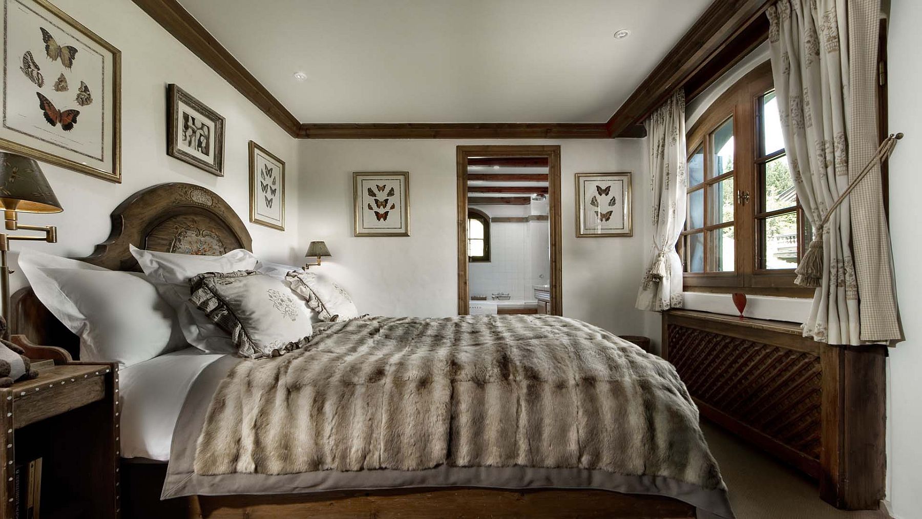 Comfy bedroom at the luxury French chalet in Courchevel