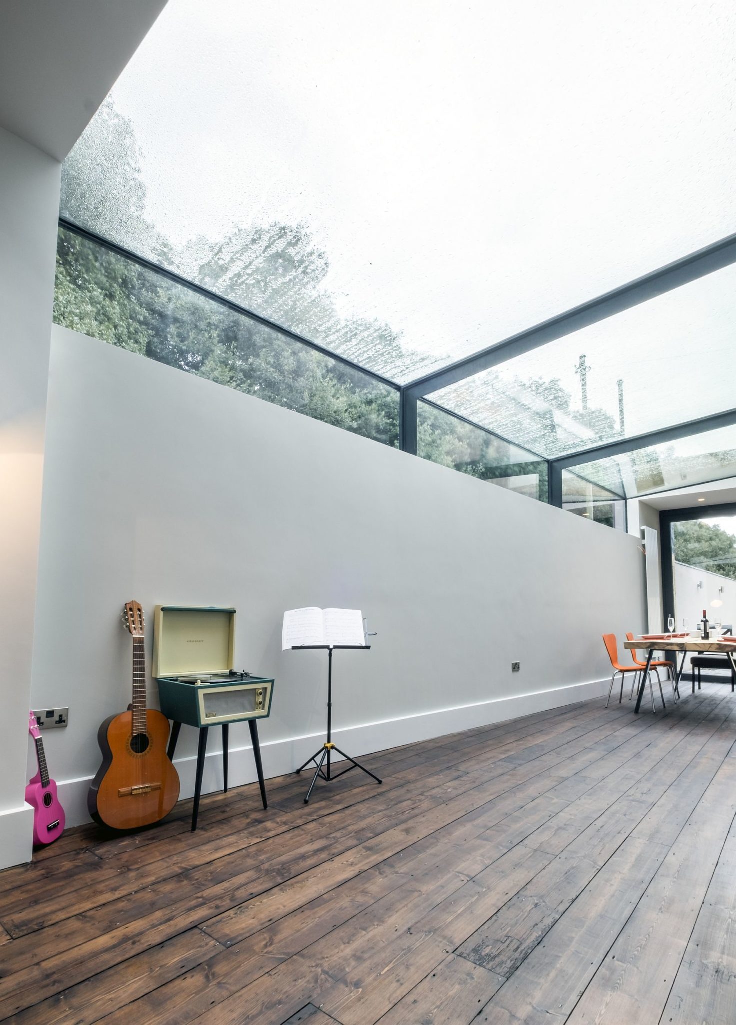 Contemporary rear addition with glass roof for the three storey Victorian house