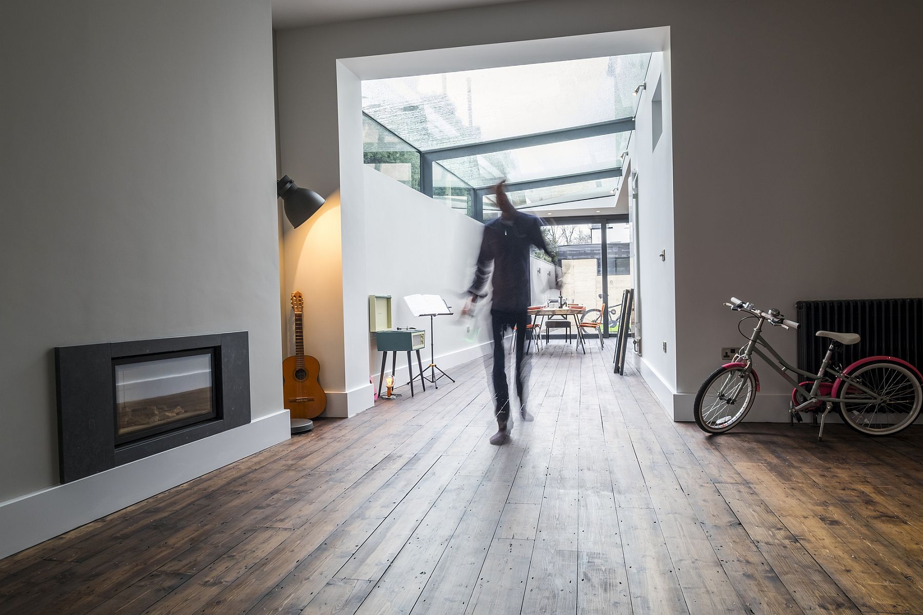 Double height extension with glass roof brings light into the Cardiff home