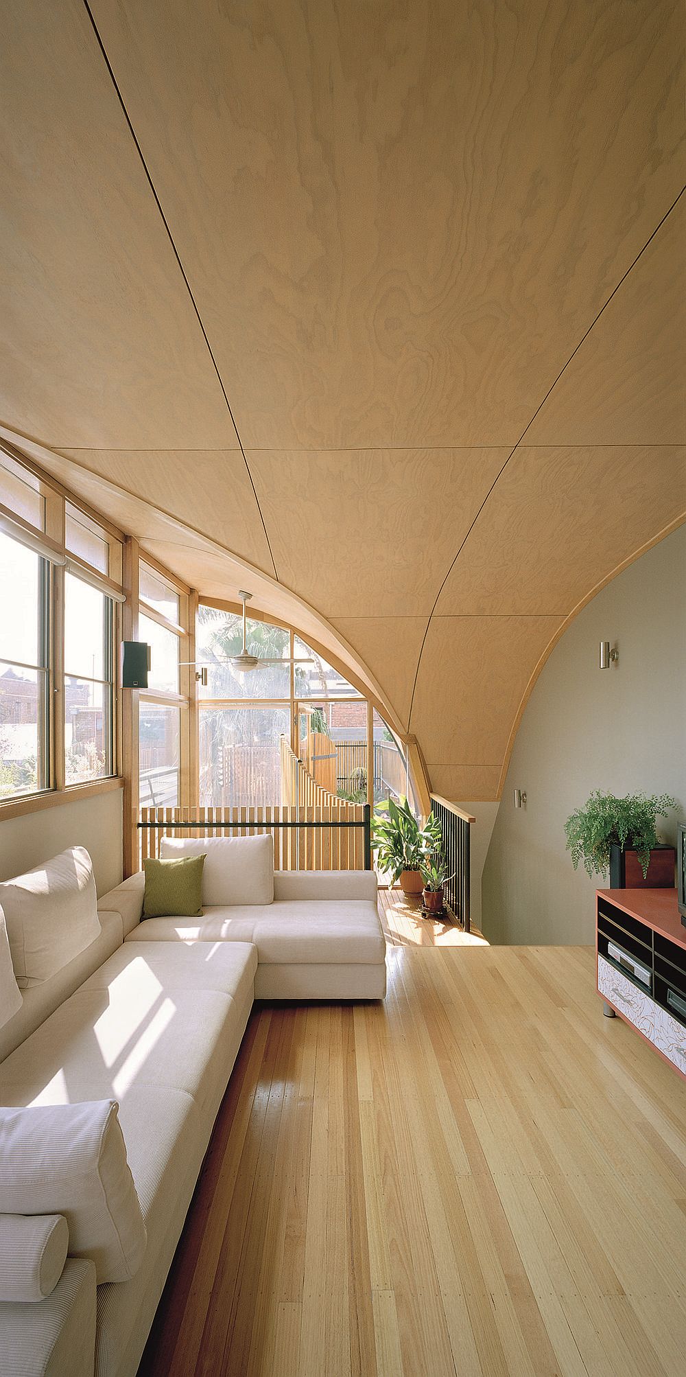 Exceptional curved roof design adds to the interior visual as well