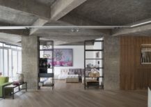 Exposed-concrete-walls-and-wooden-flooring-shape-a-stylish-industrial-loft-217x155