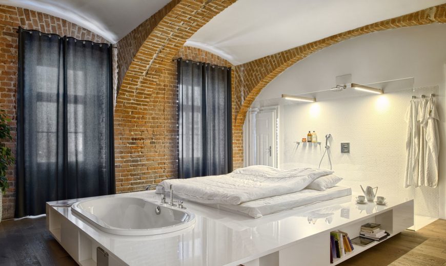Modern Apartment of a Football Player Celebrates the Beauty of Brick Walls