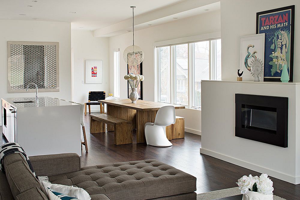 Exquisite wooden dining table and benches bring uniqueness to the interior in white