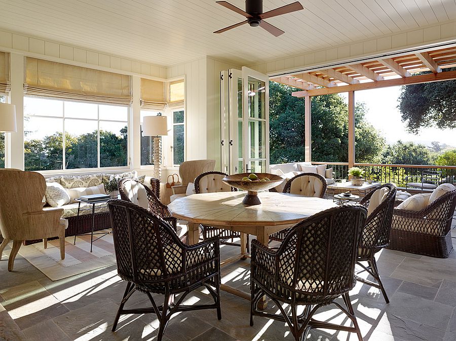 Fabulous patio and sunroom provide a wonderful outdoor living space