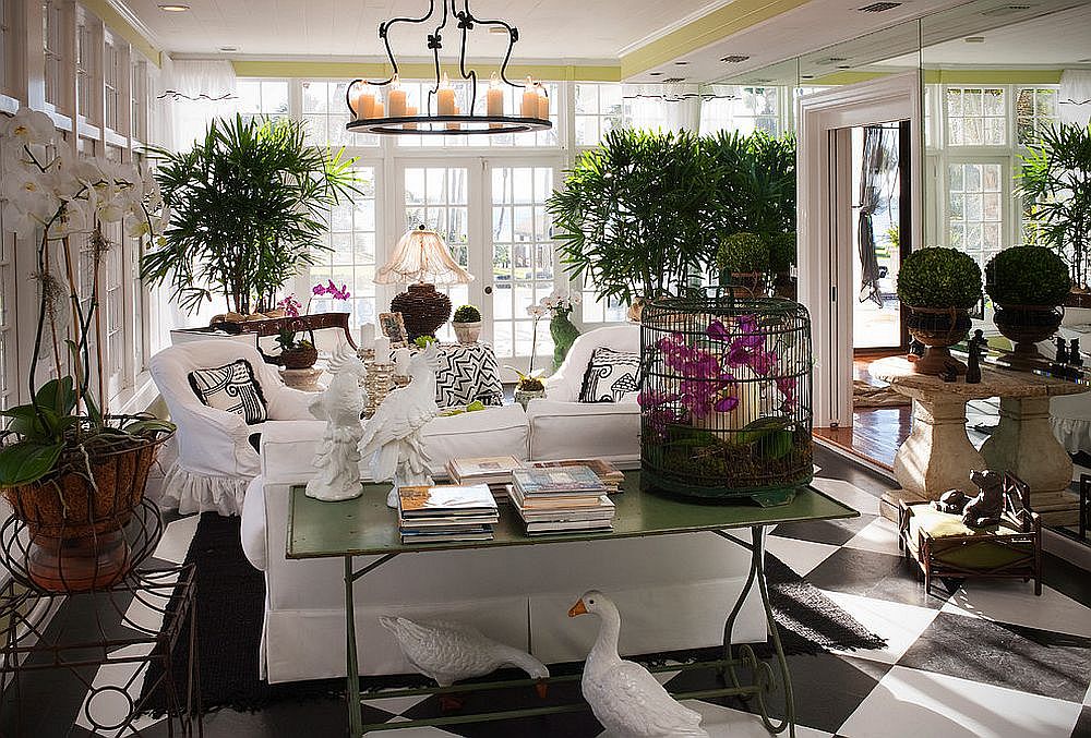 Indoor plants are a great fit inside the modern-tropical sunroom