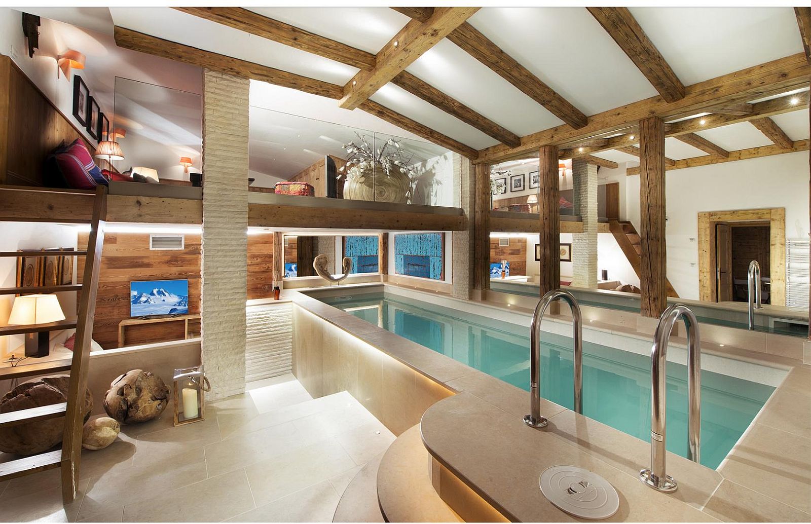 Indoor swimming pool, play area and kids room at the alpine French chalet