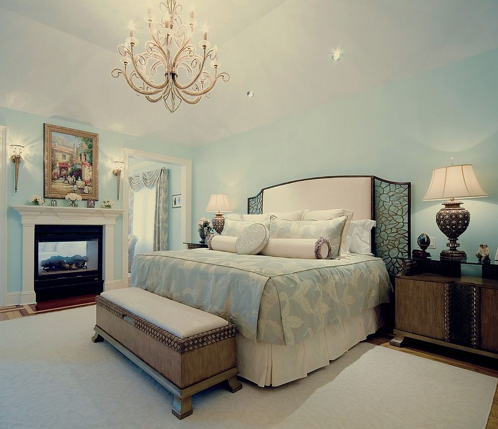 Light blue and white create a relaxing master bedroom with classic flair