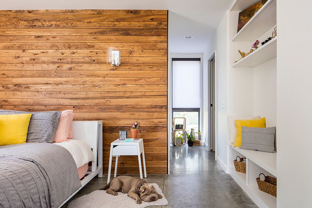 Master-bedroom-in-white-with-pops-of-yellow-and-pink-and-a-wooden-accent-wall