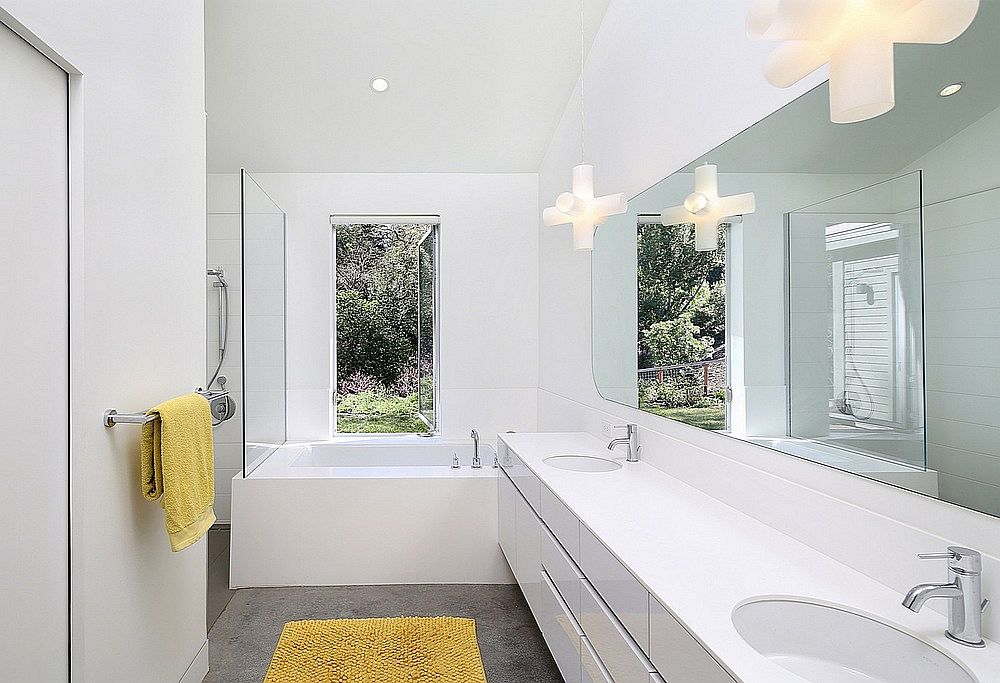 Master bedroom in white with pops of yellow