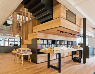 Box-Style Events Space with Tiered Seating Defines This Office!