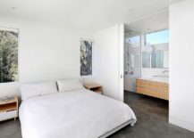 Modern-bedroom-in-white-with-a-view-of-the-canopy-outside-217x155