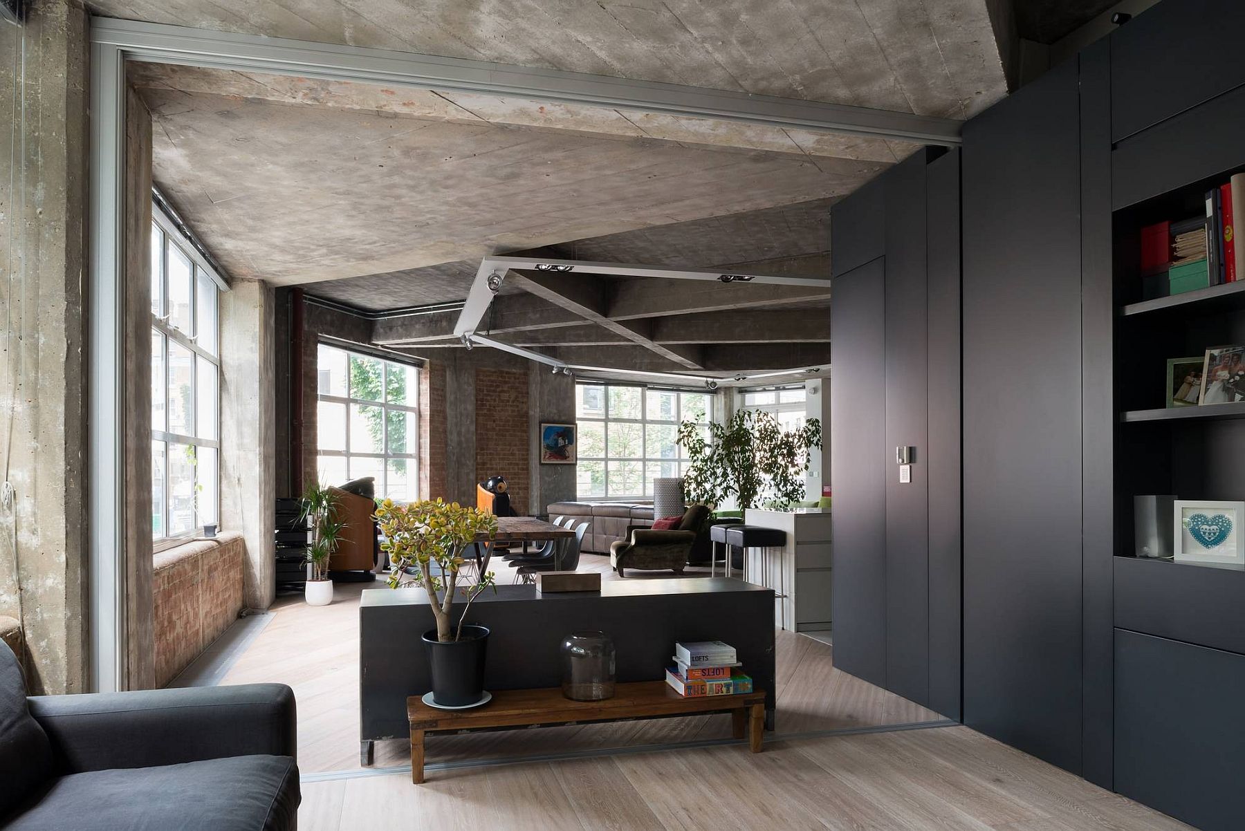 Modern joinery pieces bring modernity to the industrial loft